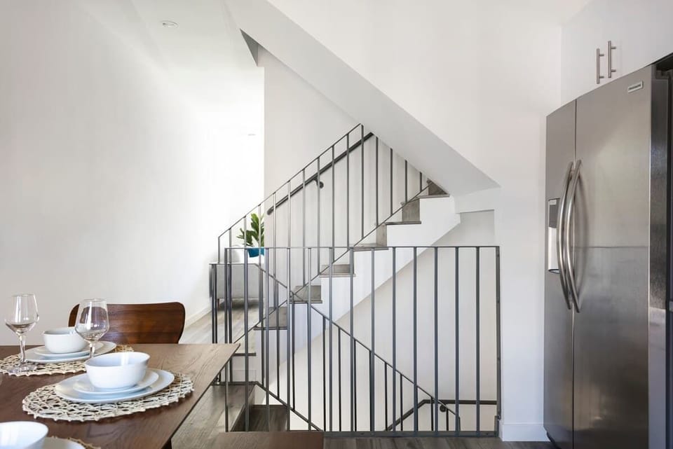 Interior stairway connecting the home’s spacious levels.