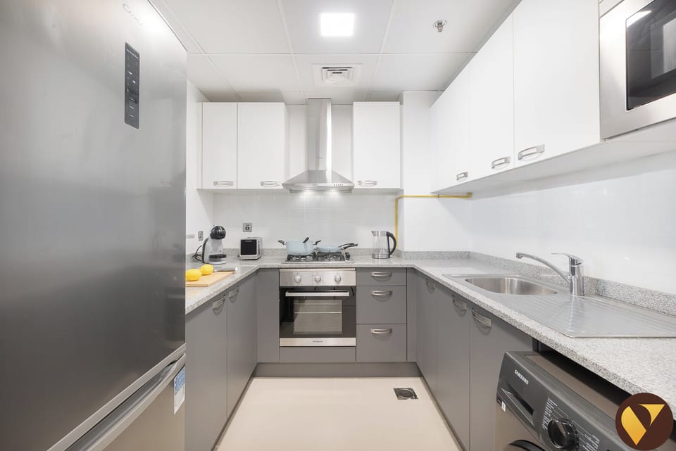 Luxury Apartment, Balcony, City View | Private kitchen | Full-size fridge, microwave, oven, stovetop