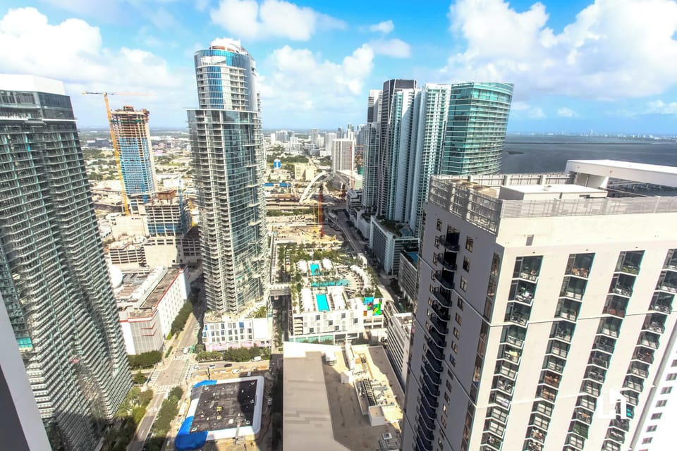 Live above the bustle. Sweeping city and ocean vistas.