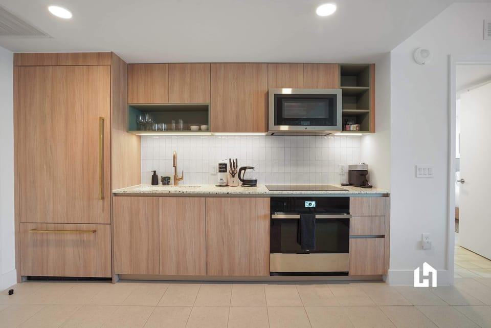 Cook up your favorites with ease in this bright, functional kitchen space.
