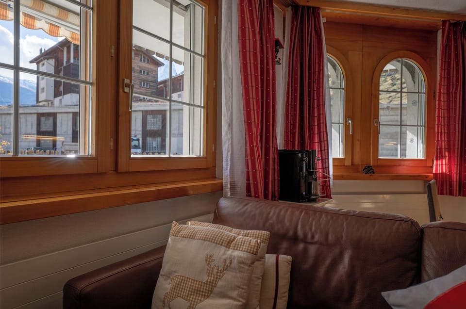 Condo, 1 King Bed with Sofa bed, Non Smoking, Mountain View | Living area | Flat-screen TV, fireplace, video-game console