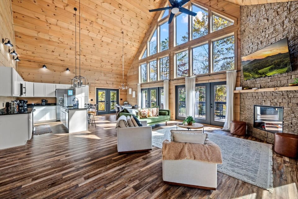Warm wood textures and bold, modern lines give the cabin its signature look—inviting yet upscale. The surrounding trees offer the perfect blend of privacy and scenic beauty.