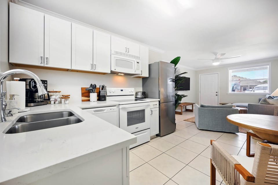 Whip up a meal in your fully equipped kitchen with table.