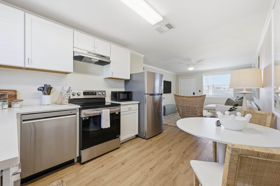 Whip up some meals in this fully functional kitchen with table to eat at