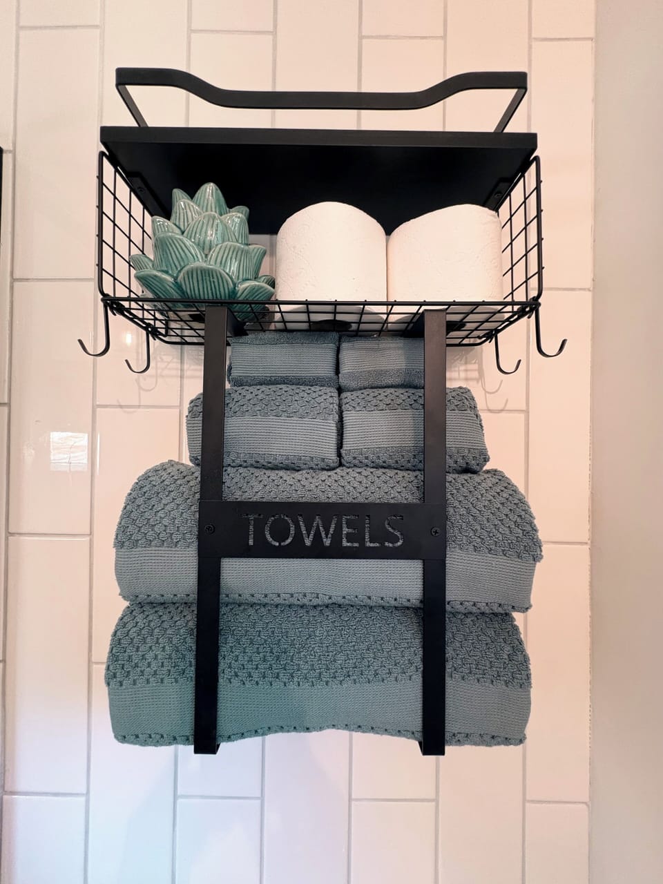 Bathroom #2 has fluffy towels, TP, tissues, soap, shampoo, and conditioner.