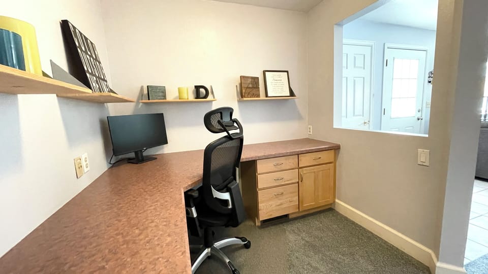 Dedicated office space with monitor provided. 