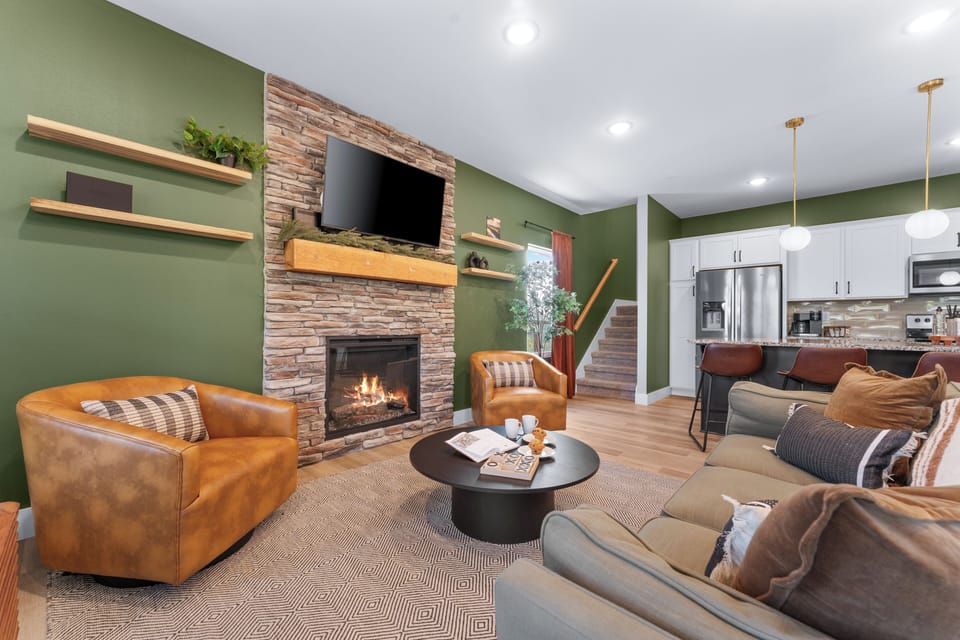 Nestled around a cozy fireplace, enjoy our inviting space with your loved ones.