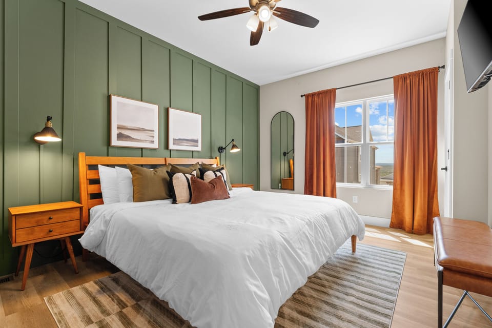 Main floor luxury: King bedroom with private en-suite for comfort & convenience.