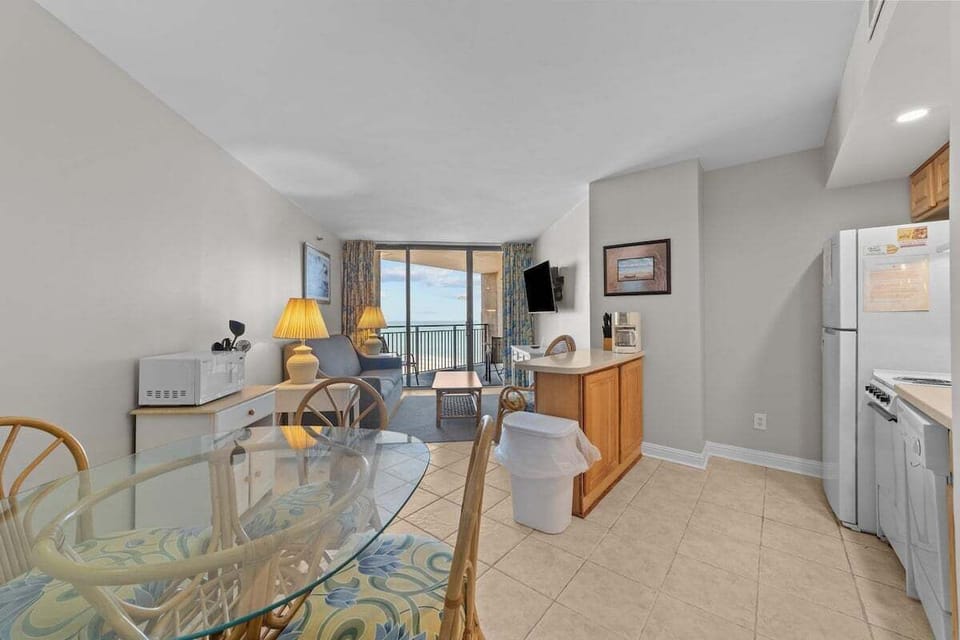 Dining, Kitchen Area, and Living Room.