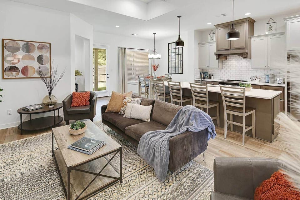 Open living, dining, kitchen space.  Perfect for family gatherings and entertaining!