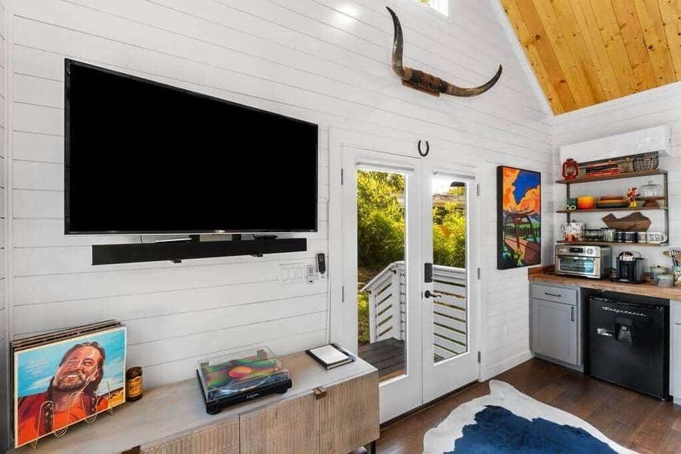 TV with soundbar and turntable