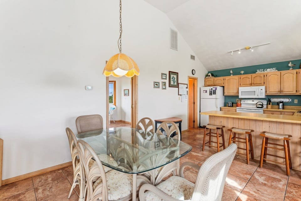 Share family meals and laughter around the spacious dining table with seating for everyone.
