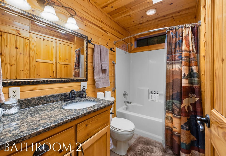 Bathroom 2 with granite vanity and full tub/shower
