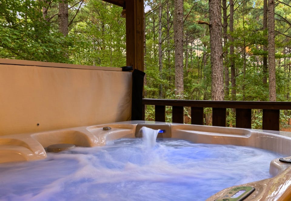 Relax in your private bubbling hot tub surrounded by forest serenity