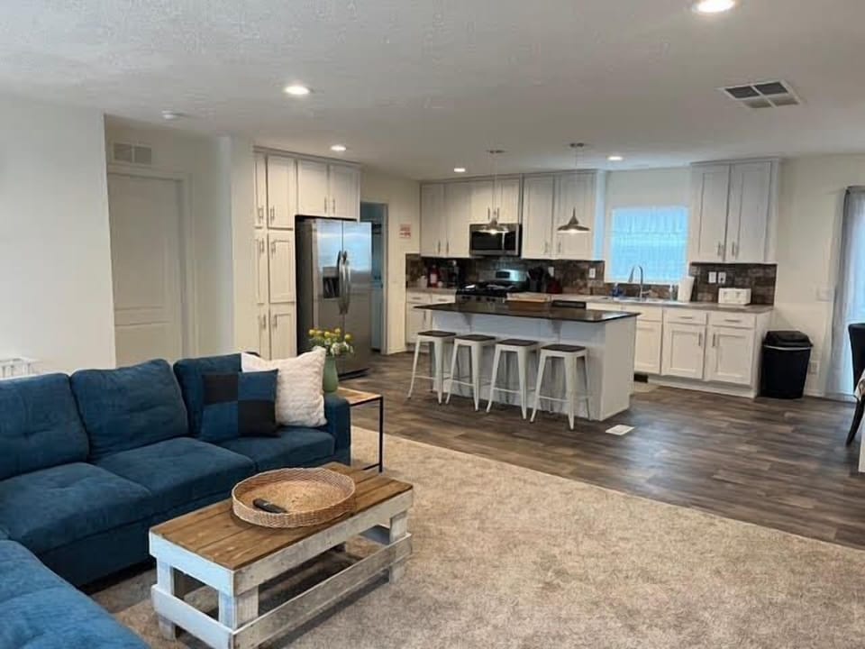 Comfortable and bright living, kitchen and dining area.