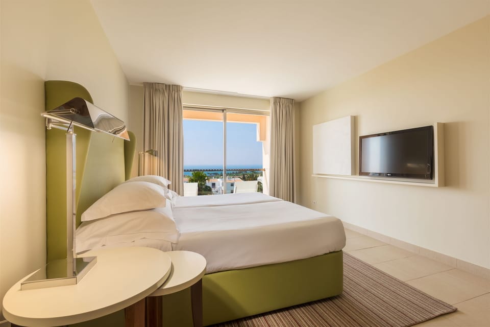 Suite, 2 Bedrooms, Sea View | Minibar, in-room safe, blackout drapes, soundproofing