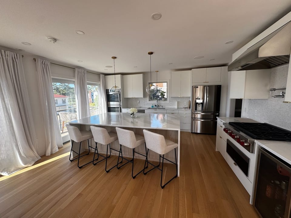 Kitchen with top of the line appliance, Pantry and coffee station hidden in nook