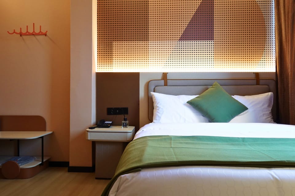 Deluxe Double Room | Minibar (free items), desk, laptop workspace, soundproofing