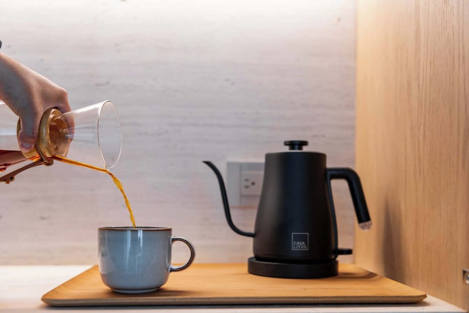 Fresh scents await—Chemex coffee kit fully stocked for your stay.

