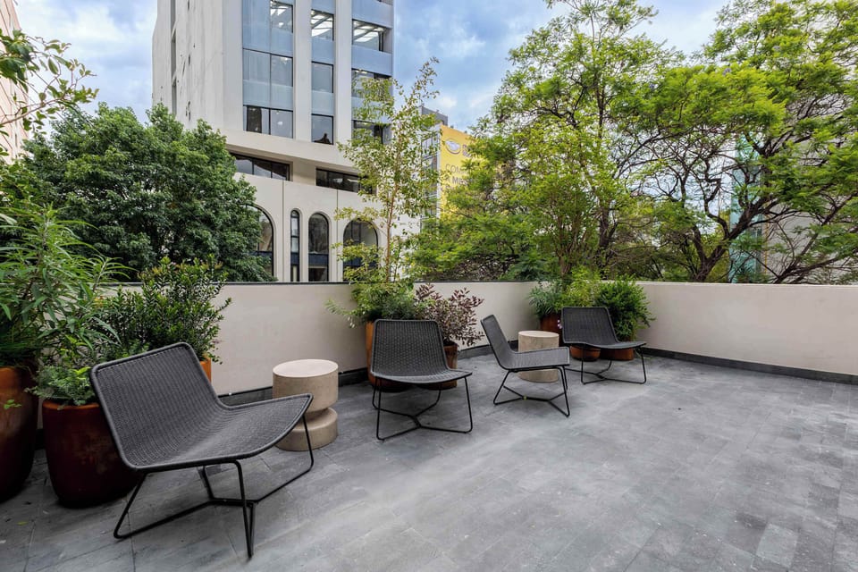 Shared rooftop offering panoramic cityscapes.


