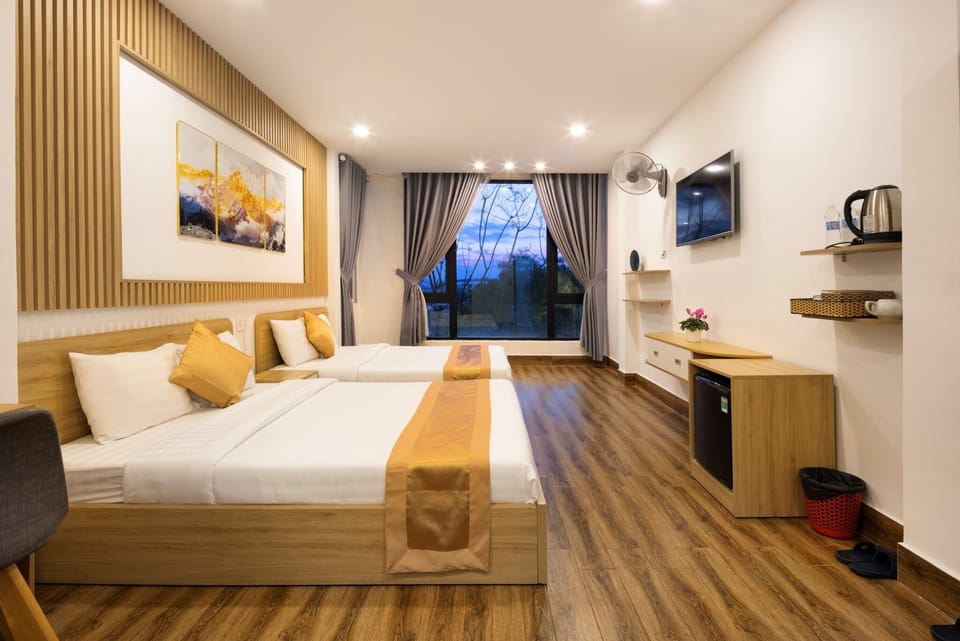 Luxury Quadruple Room | Desk, laptop workspace, blackout drapes, free WiFi