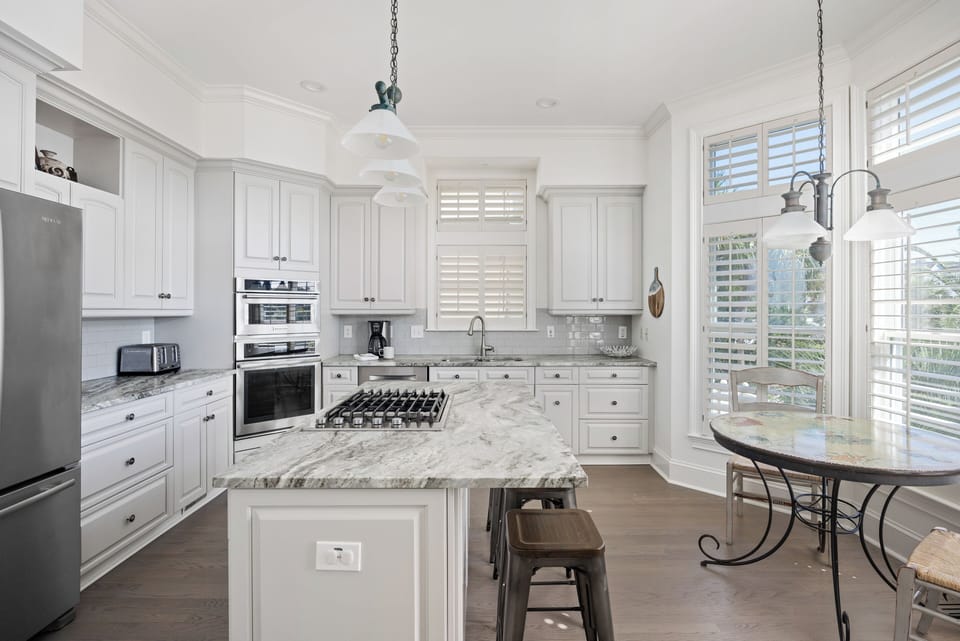 Spacious chef’s kitchen with premium appliances.