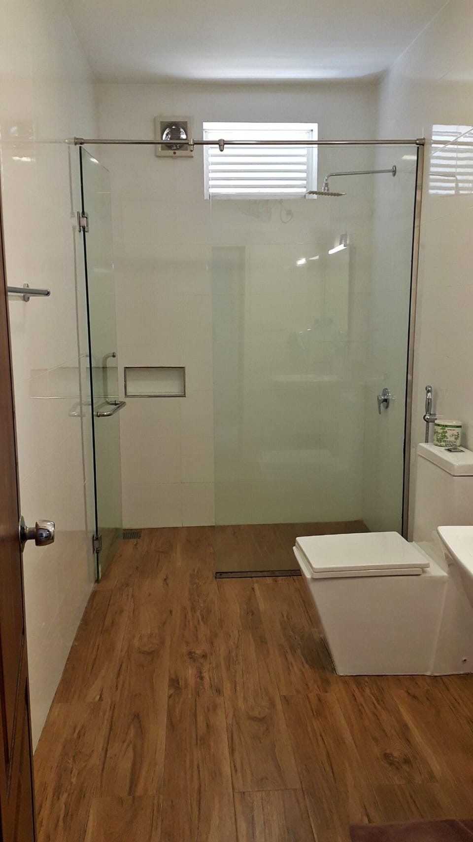 Shower, hair dryer, towels, toilet paper