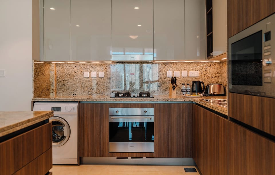 Deluxe Apartment, Balcony, City View | Private kitchen | Espresso maker, electric kettle