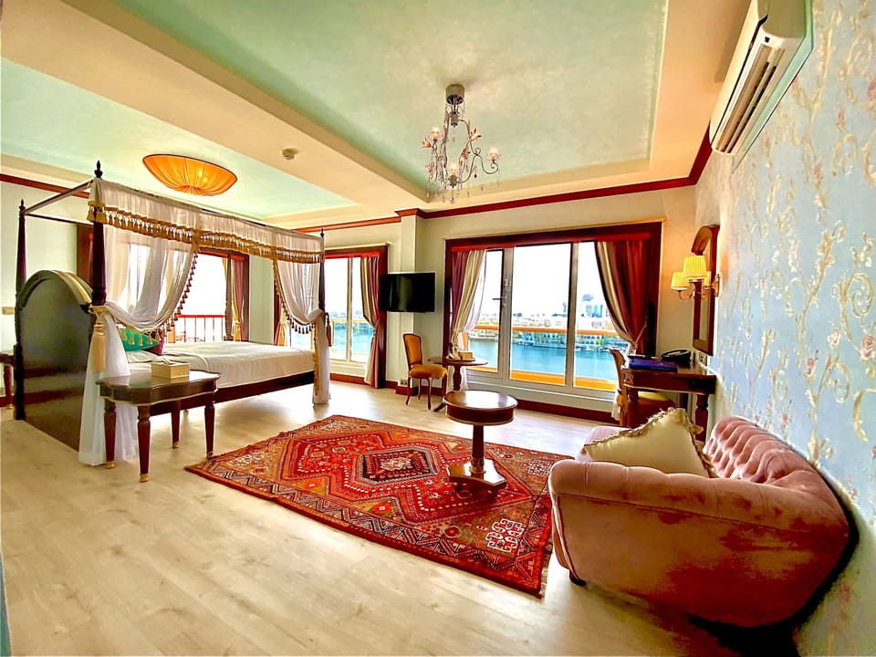 Royal Suite, Balcony (Dubai Creek View) | Minibar, in-room safe, individually decorated, individually furnished