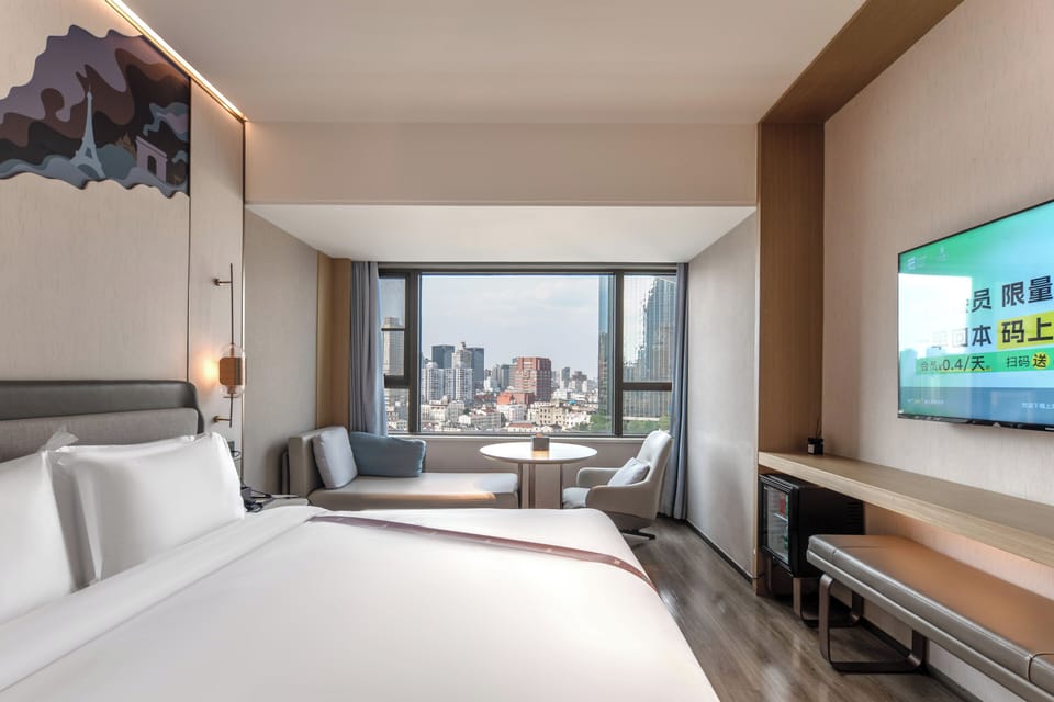 Superior Double Room, City View | Down comforters, minibar, desk, laptop workspace