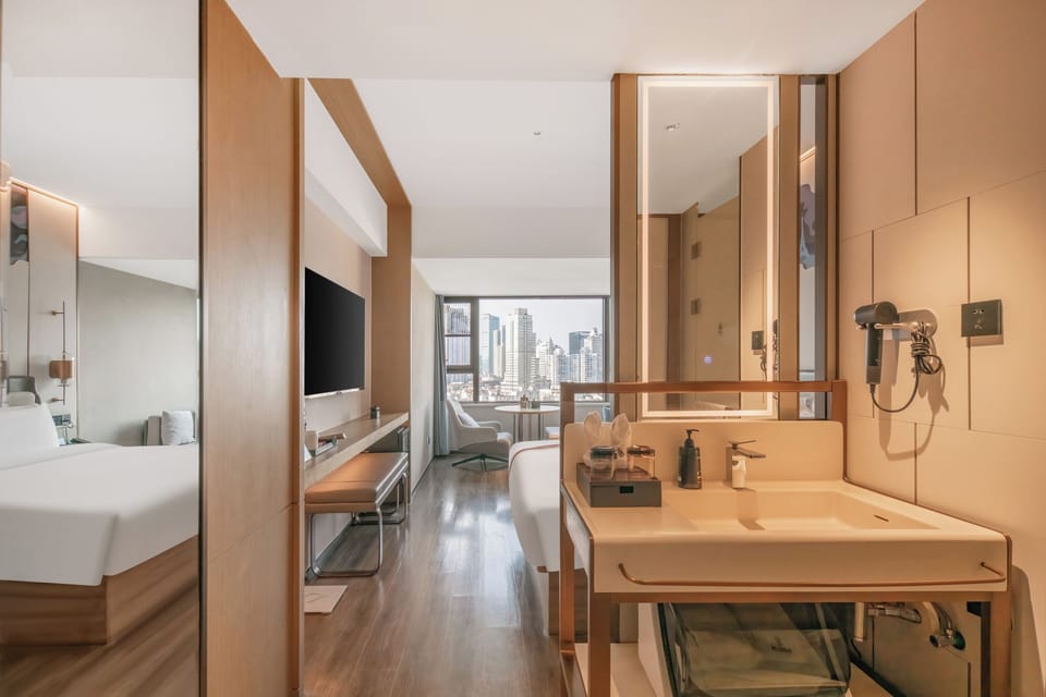 Executive Double Room, City View | Down comforters, minibar, desk, laptop workspace
