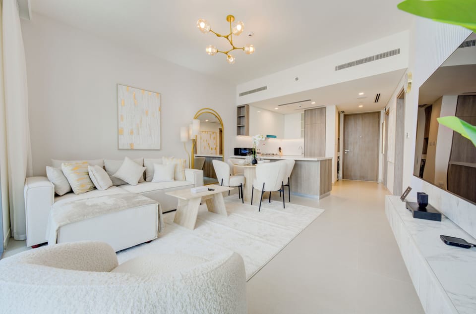 Deluxe Apartment, Balcony, Marina View | Living area | 55-inch Smart TV with digital channels