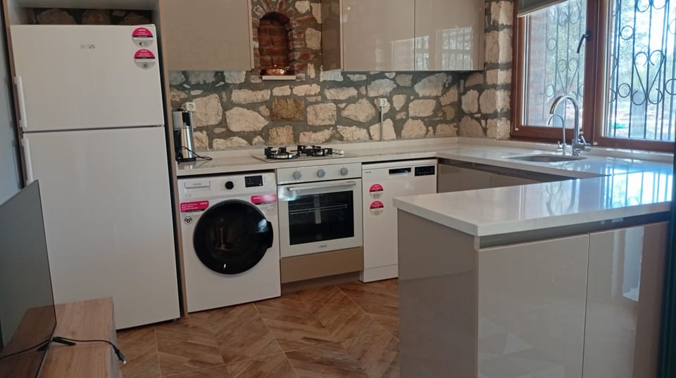 Family Double Room, Garden View | Private kitchenette | Highchair