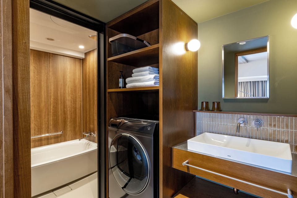Free toiletries, hair dryer, slippers, electronic bidet