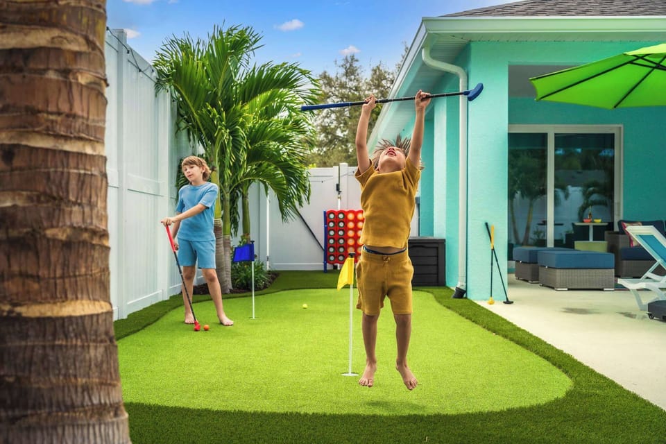 Outdoor Fun: Enjoy mini-golf and vibrant yard games in your sunny Bradenton retreat!