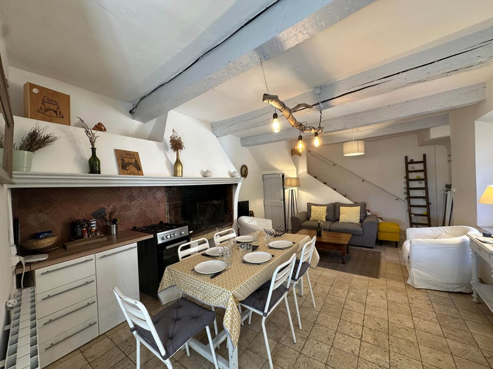 dining area, kitchen, table, living room, sofa, oven, TV