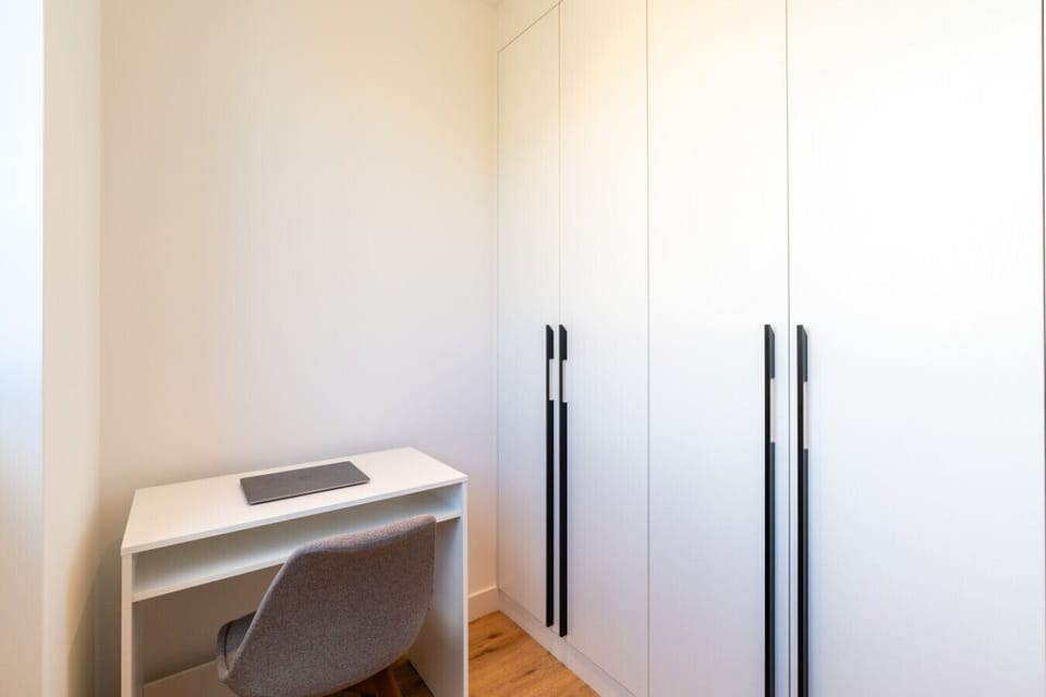 Bright workspace with natural light and a minimalist design.