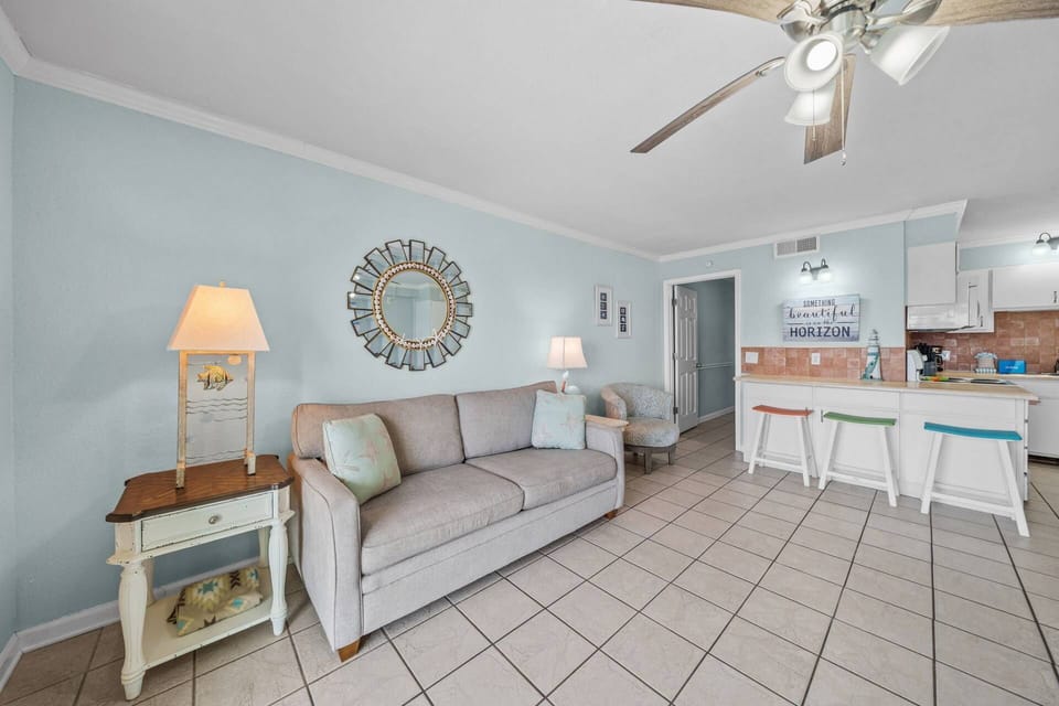 Bright, open, and coastal cozy — the perfect living room to relax, recharge, and plan your next adventure. Something beautiful really is on the horizo