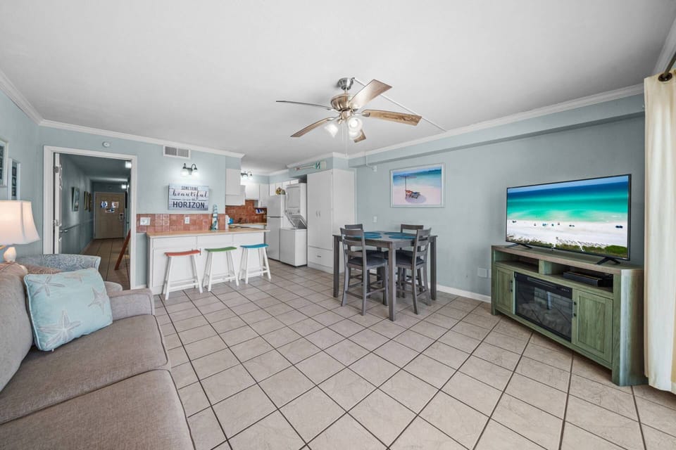 Spacious open living and dining area with bar seating, a full kitchen, and all the room your group needs to spread out and relax.