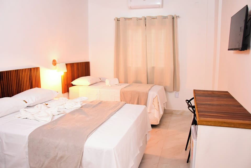 Desk, laptop workspace, free WiFi, bed sheets