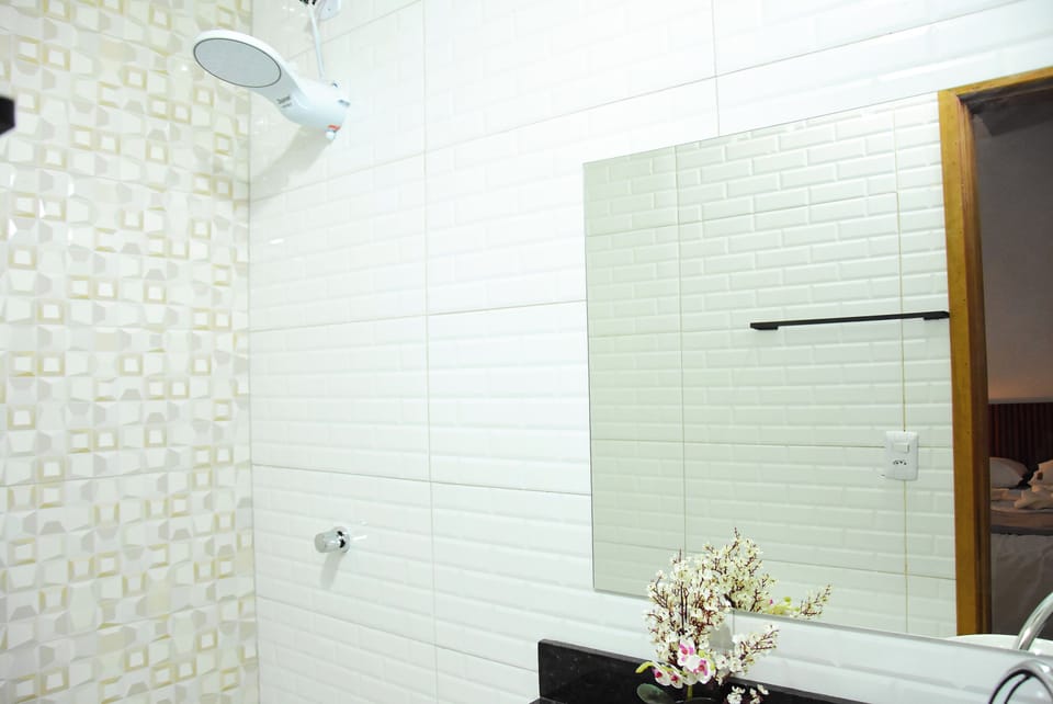 Comfort Triple Room | Bathroom | Shower, towels, soap, toilet paper