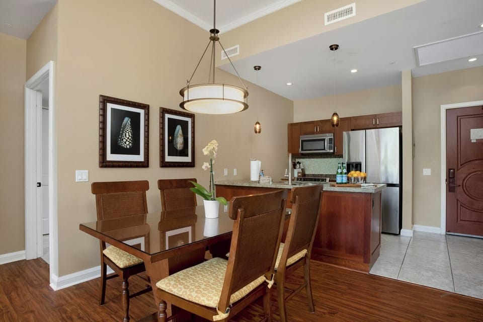 Share meals and conversation at your dining table, positioned between the granite kitchen and cozy living room. HKK-140