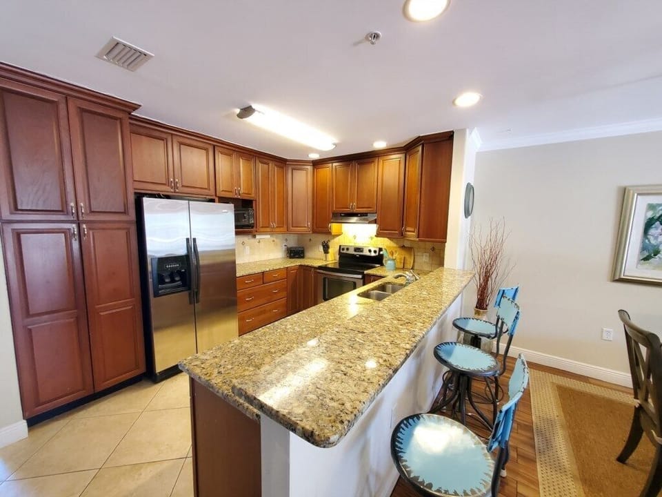 Condo, Multiple Beds, Patio, Pool View (Ocean Reef 306) | Private kitchen | Dining table