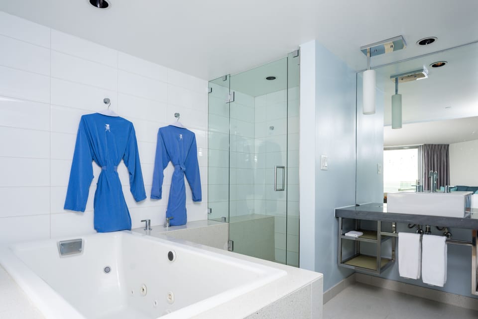 SANCTUARY SUITE | Bathroom | Designer toiletries, hair dryer, bathrobes, towels