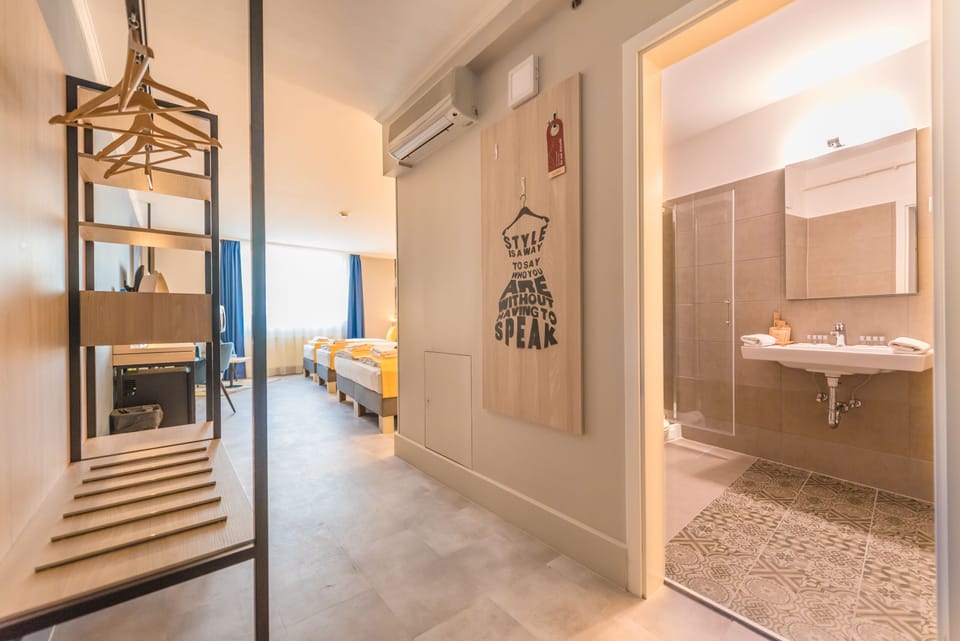 Comfort Quadruple Room | In-room safe, blackout drapes, iron/ironing board, free WiFi