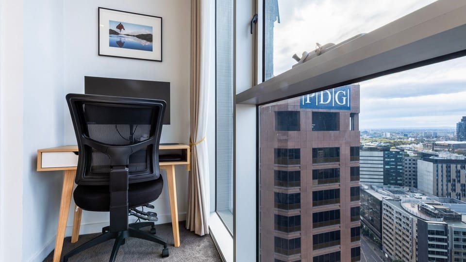 Stay productive in the dedicated workspace with skyline views.
