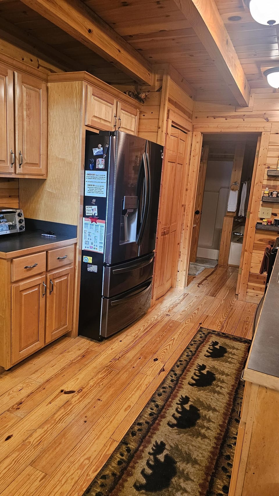 Kitchen with rustic wood accents and modern appliances