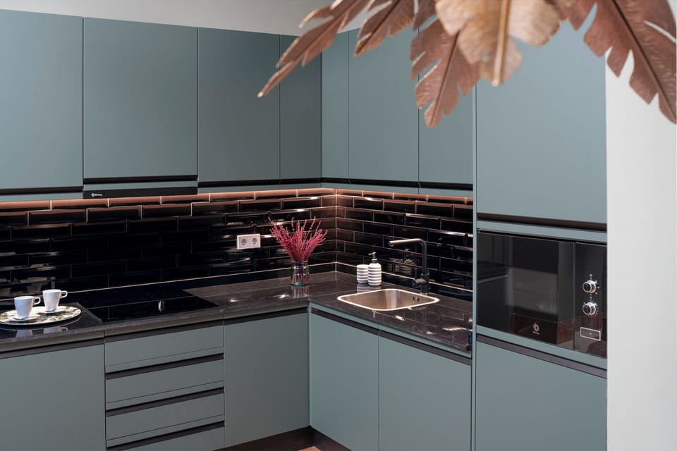 Apartamento con balcón | Private kitchenette | Coffee/tea maker