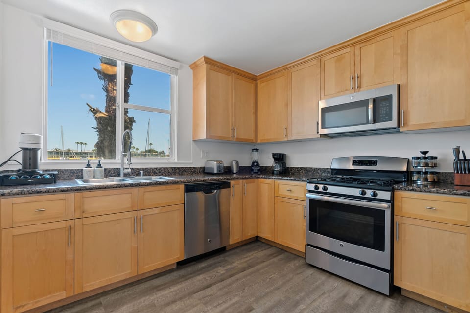 Gourmet kitchen with stainless steel appliances.