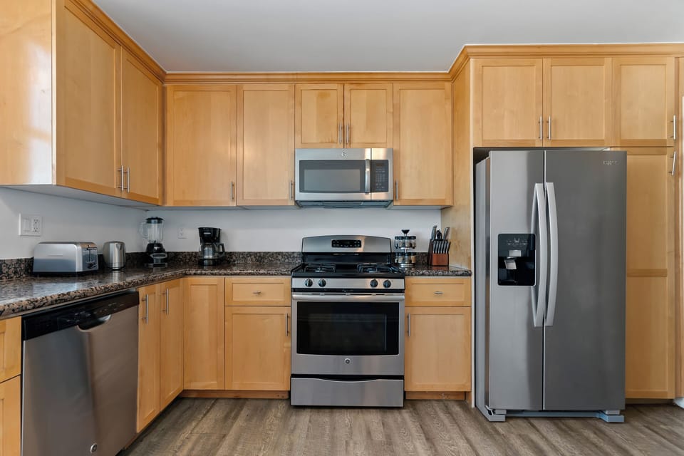 Full-size refrigerator with water and ice dispenser.